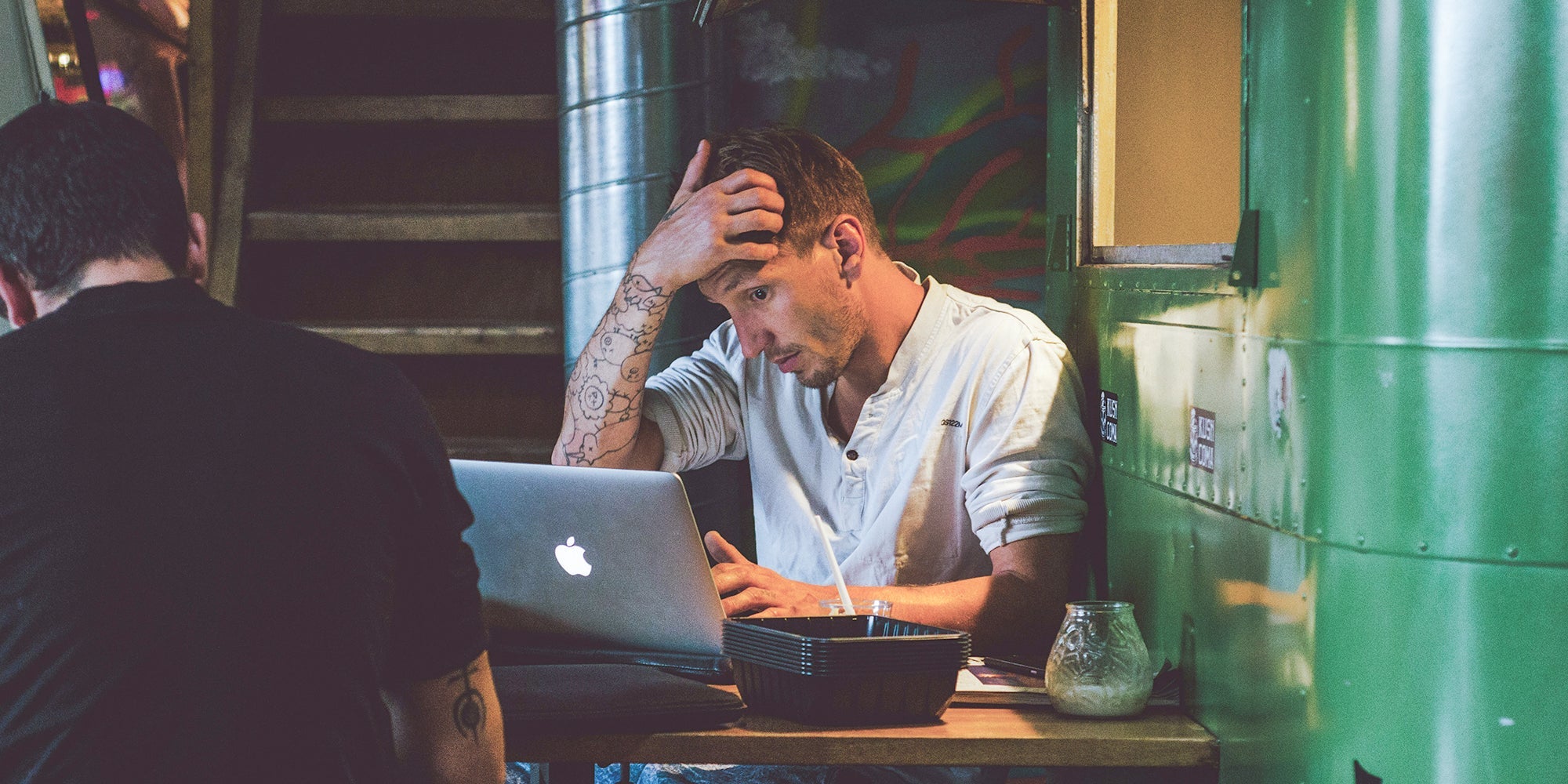 Man concentrating in front of laptop