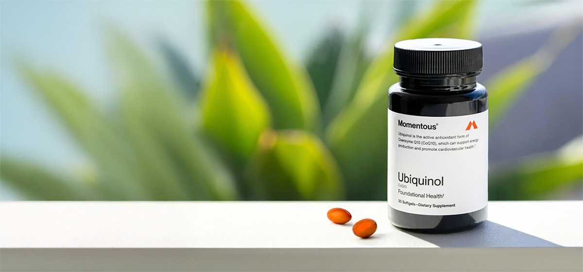 a bottle of Momentous Ubiquinol